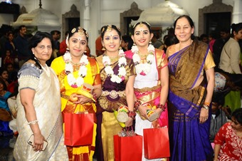 AT 4 HTA_pres Sheela Lingam and Puja Committee chair Padma Koganti with dance performers 340.jpg